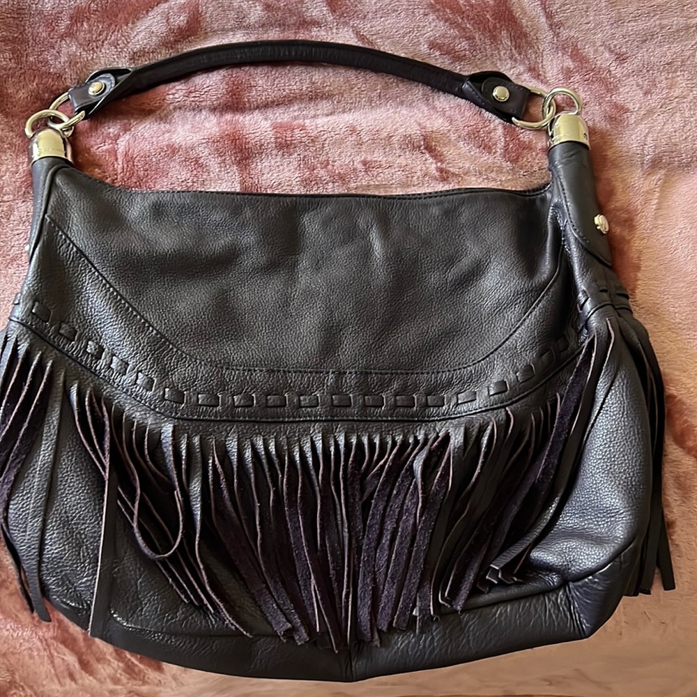 Purple leather handbag with fringe
